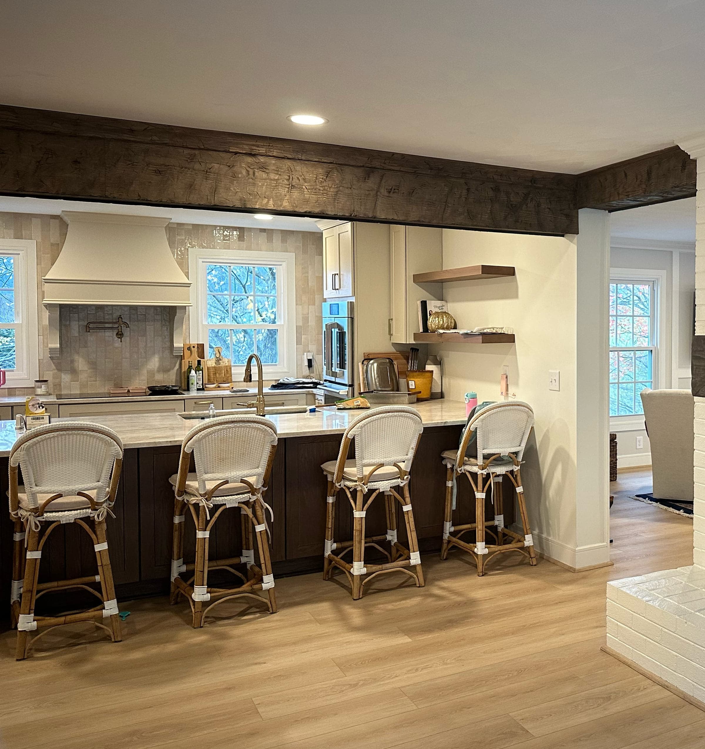 Custom kitchen in a Roanoke County home, with the walls opened up under rough sawn beams, a new layout, new floors and tile